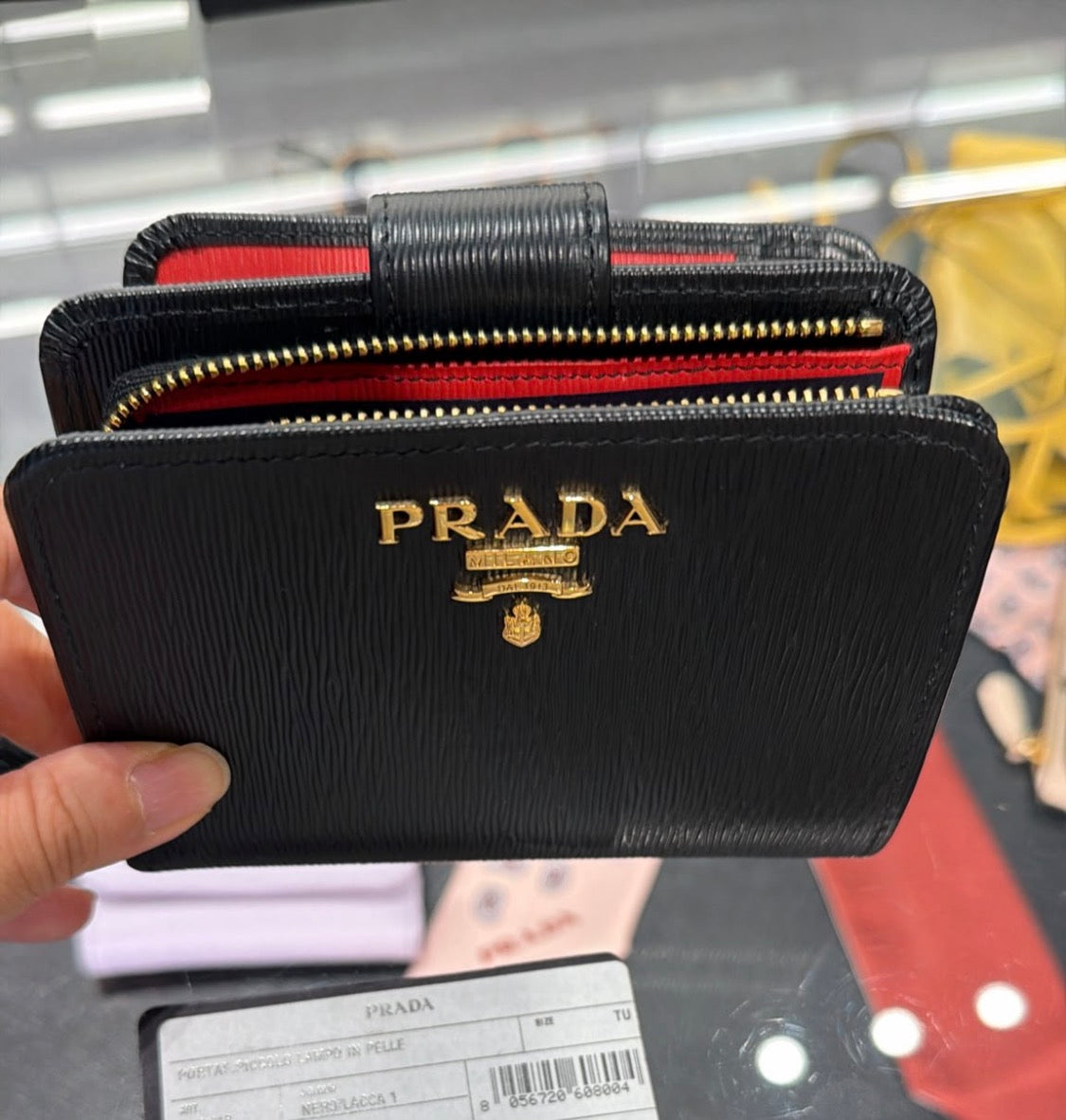 Prada Bifold Vitello Move Leather Wallet